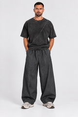 PANTALONE OVER CON TASCHE DIETRO