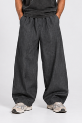 PANTALONE OVER CON TASCHE DIETRO