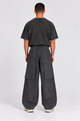 PANTALONE OVER CON TASCHE DIETRO