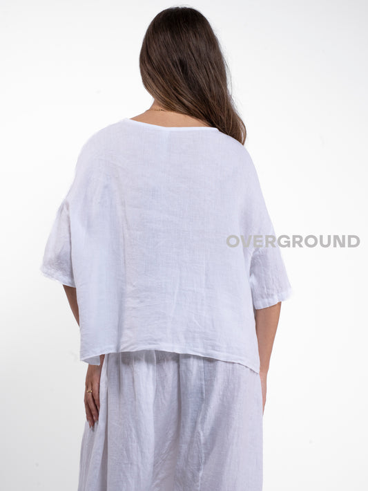 BLUSA CORTA LINO CON TASCA LATERALE