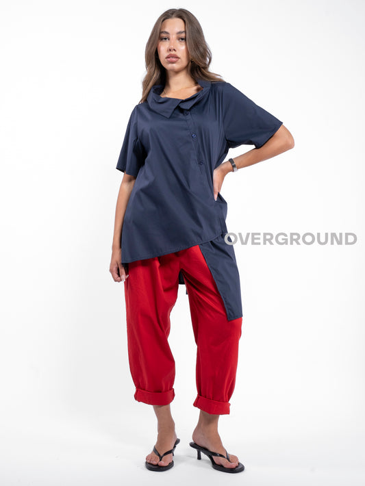 BLUSA ASIMMETRICA CON BOTTONI DAVANTI